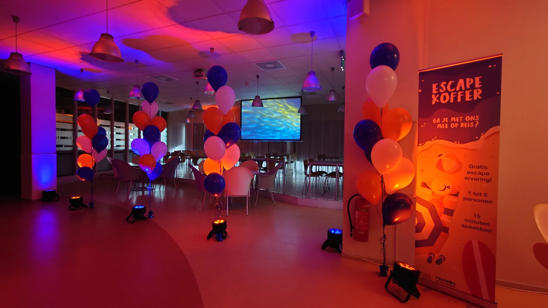 Restaurant with balloons, plants and a light projection