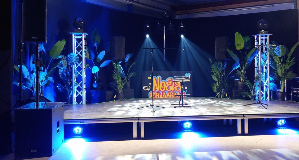 Stage with plants and green lighting